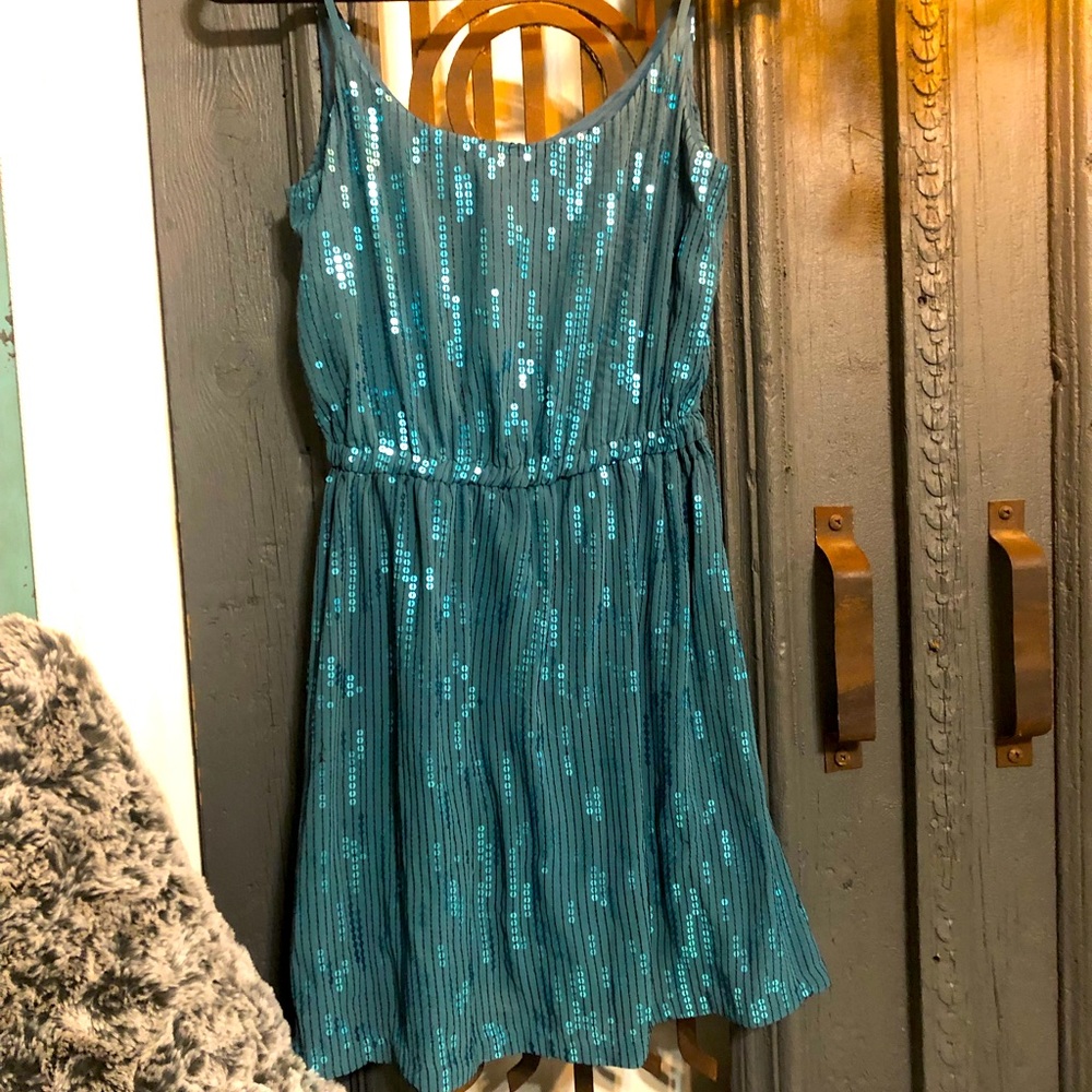 Fun and summery! Cute dress with spaghetti straps, size small.